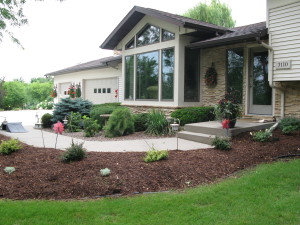 Cottage Grove WI Landscaping Remodel - Pavers, barriers, plants, firepit, inground firepit, mulch, rock, retaining wall, extend pool patio, pavers